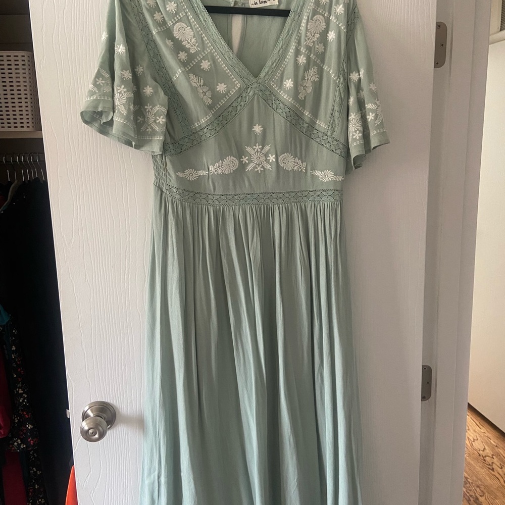Brand NEW mint green with true embroidery on the top!
